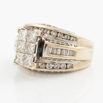 Ring, 14K gold with princess, baguette, and round brilliant-cut diamonds.