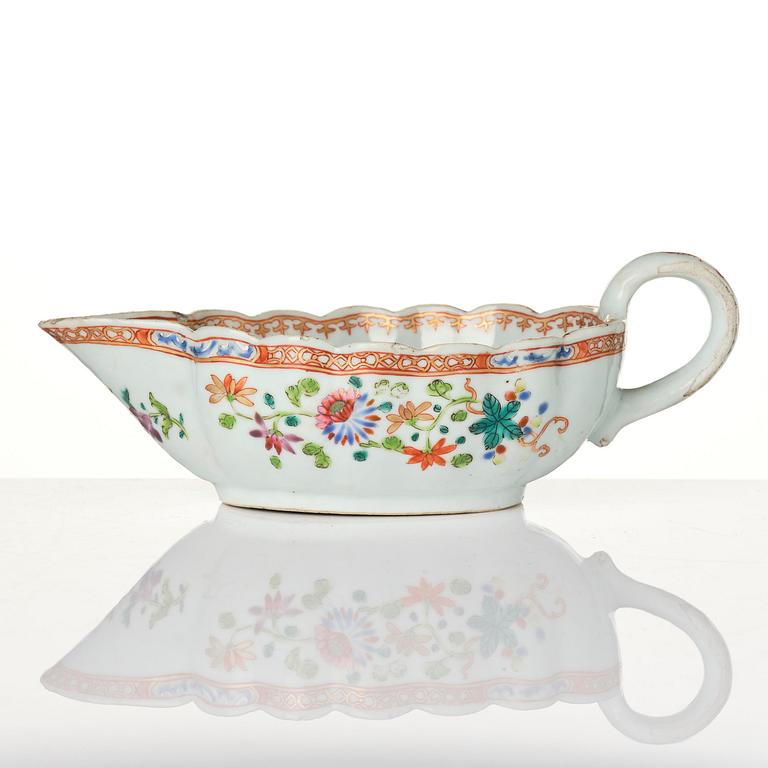 A group of famille rose 'double peacock' serving dishes, Qing dynasty, Qianlong (1736-95). (8 pieces).