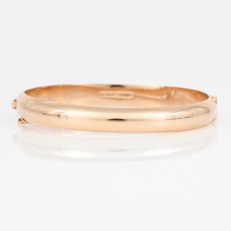 ARMRING, 14K guld.  Finland 1965. Total vikt 14,2 g.