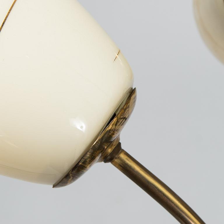 A mid-20th-century brass ceiling light, Finland.