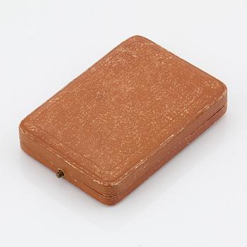 A 14K gold necklace set with a faceted amethyst and pearls.