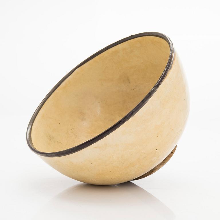 A creme glazed bowl, presumably Song/Yuan dynasty.