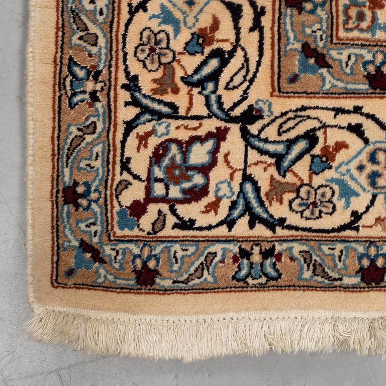 A carpet, Old Nain, part silk, ca 285 x 198 cm.