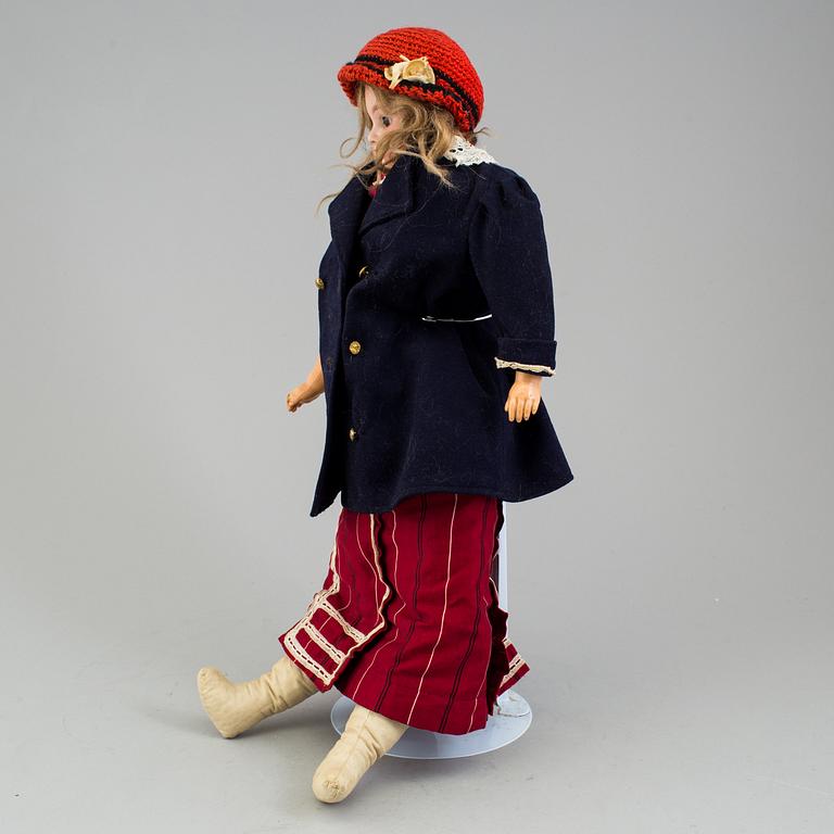 An Armand Marseille 3200 DEP Made in Germany bisque head doll.