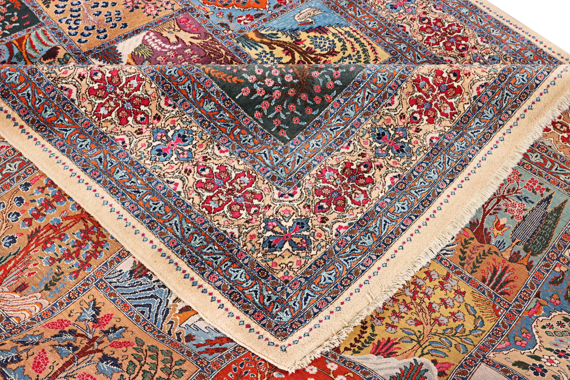 A Kashmar carpet, c. 387 x 297 cm.