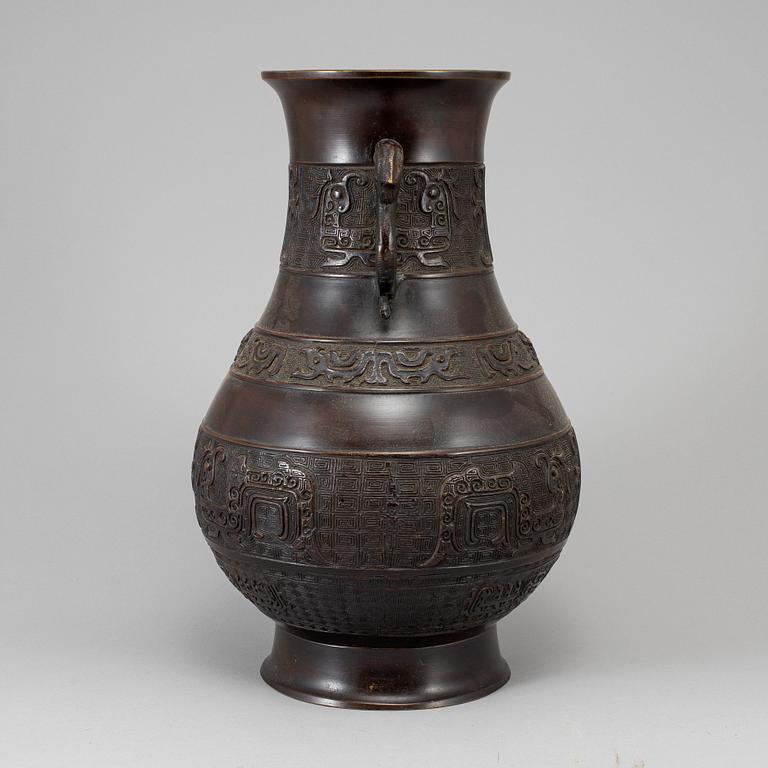 A bronze vase,  Japan, early 20th Century. After a Chinese archaic bronze model.