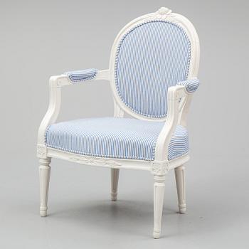 A Gustavian armchair by Erik Öhrmark, (Stockholm 1777-1813).