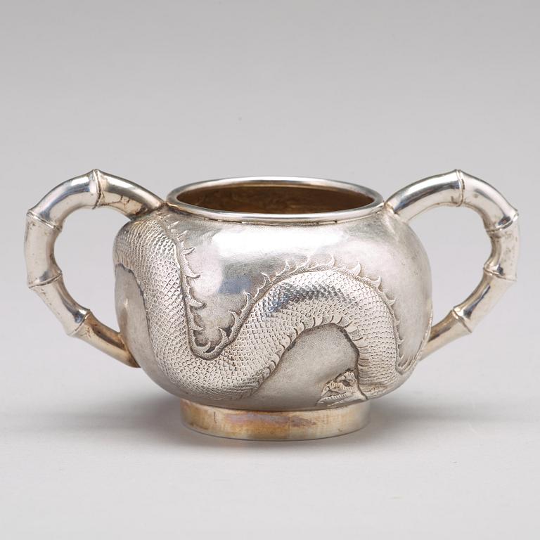 A Chinese four piece silver tea set, Luen Wo, Shanghai, 1875-1925.