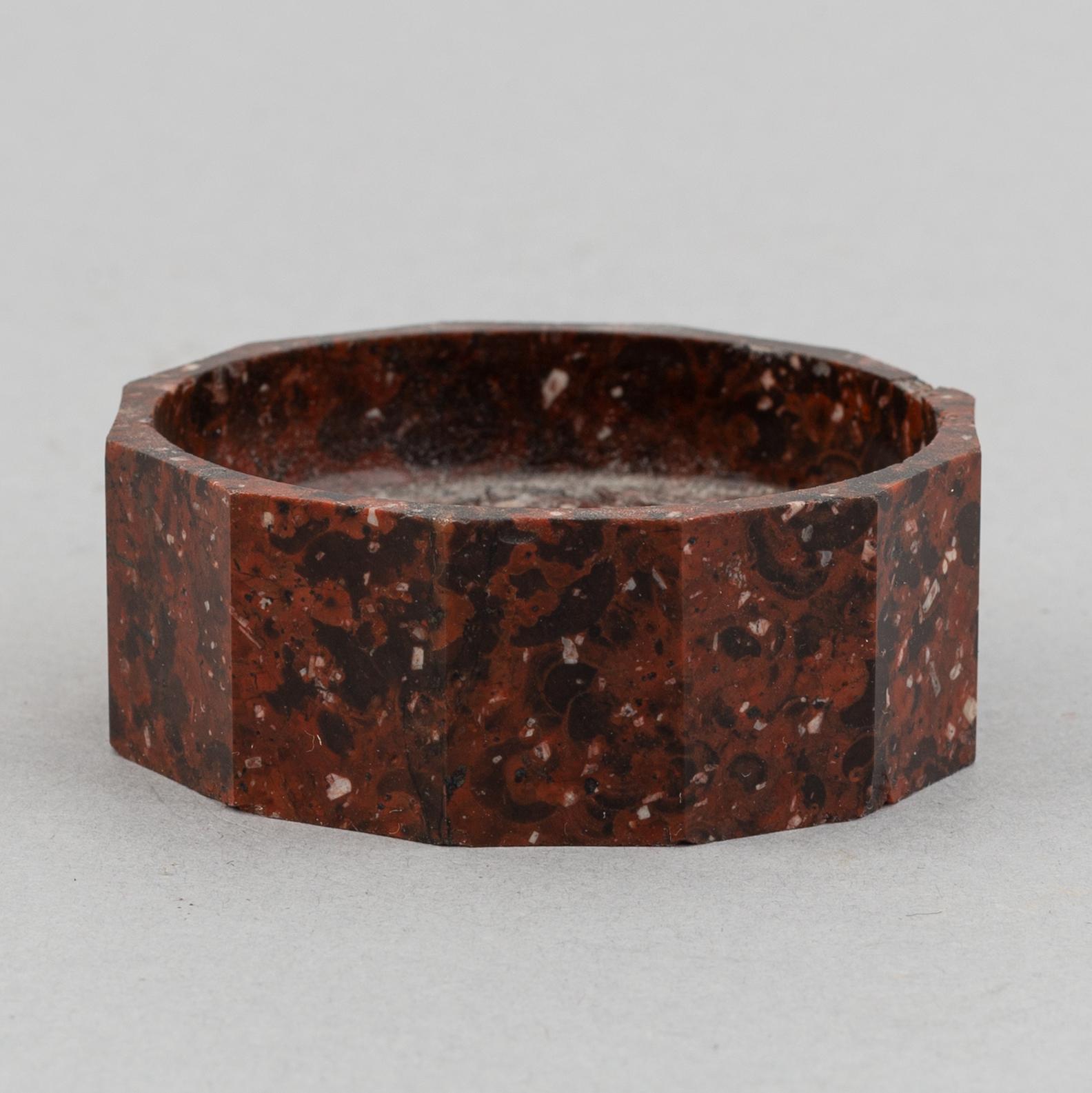 A porphyry mantle clock, salt cellar and cullflinks, 20th century.