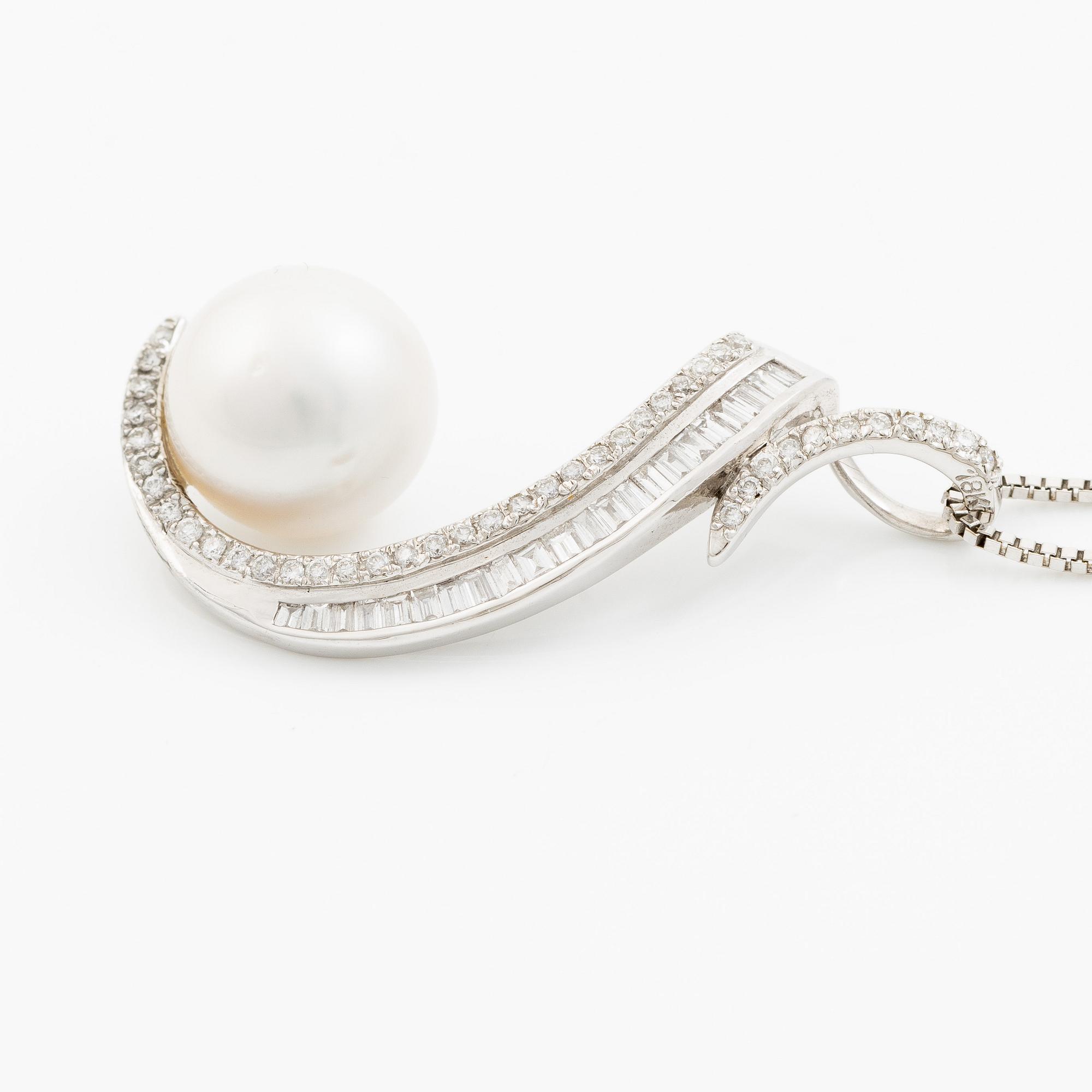 Pendant, 18K white gold with a cultured pearl and baguette and brilliant-cut diamonds.