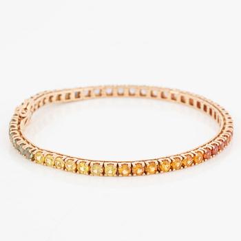 Bracelet, 18K gold with multi-coloured sapphires.