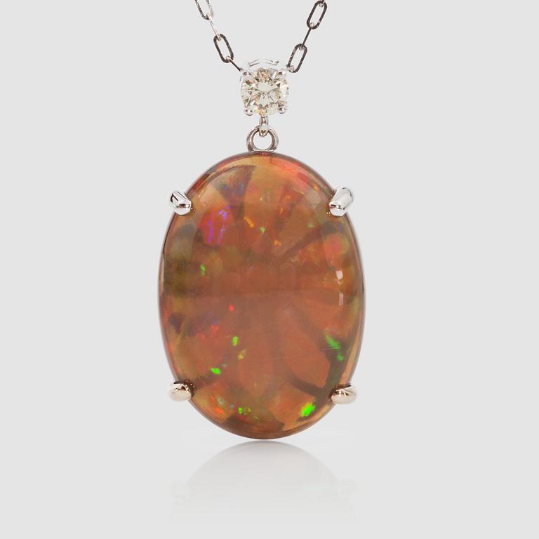 A 8.75 ct honey-opal and brilliant-cut diamond pendant. Chain included.
