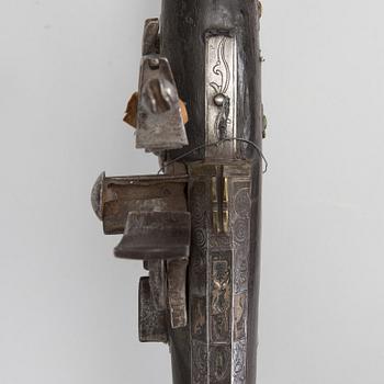 A NORTH AFRICAN FLINTLOCK GUN, 19th century.