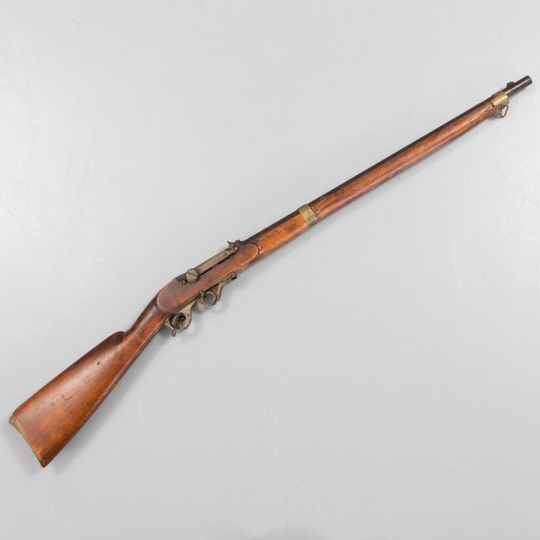 A mid 19th century PJ Malherbe & Cie A Liege rifle.