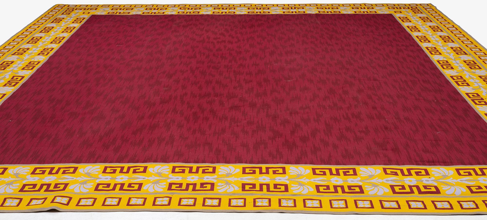 A tapestry weave carpet, c. 528 x 473 cm, signed Aubusson.