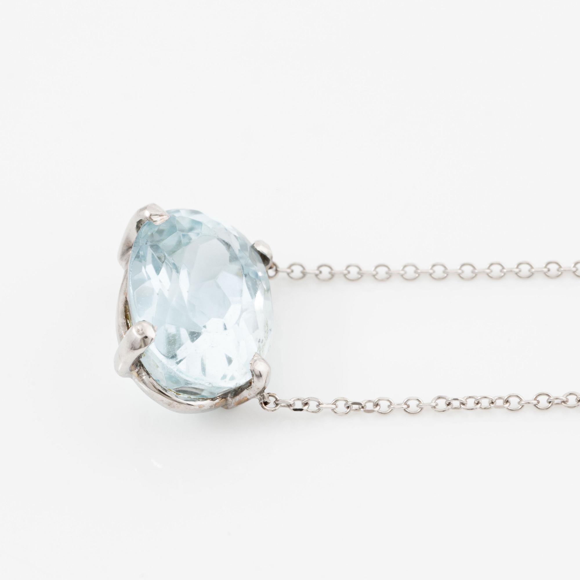 Necklace, 18K white gold with oval-cut aquamarine.