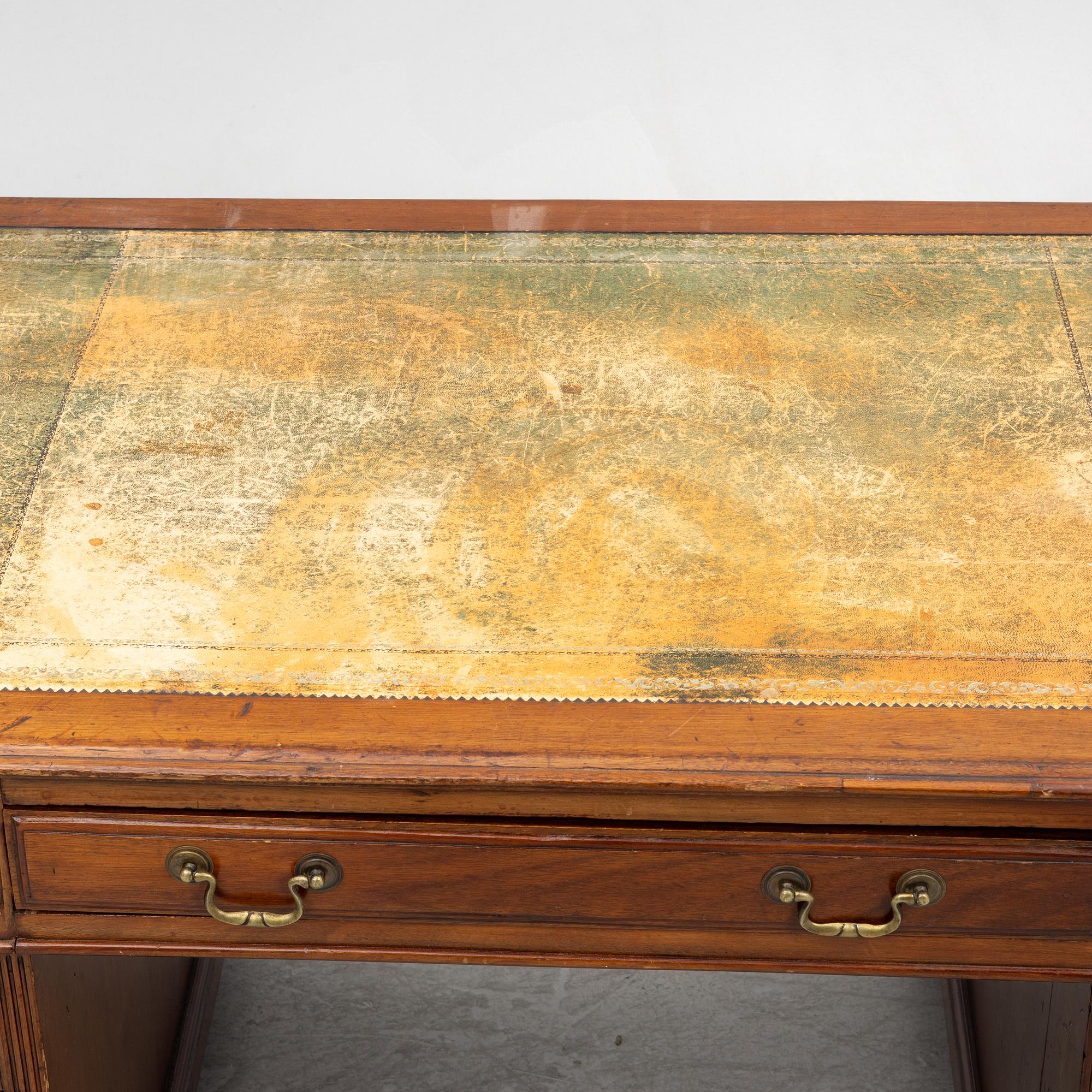 A 20th century writing desk, England.