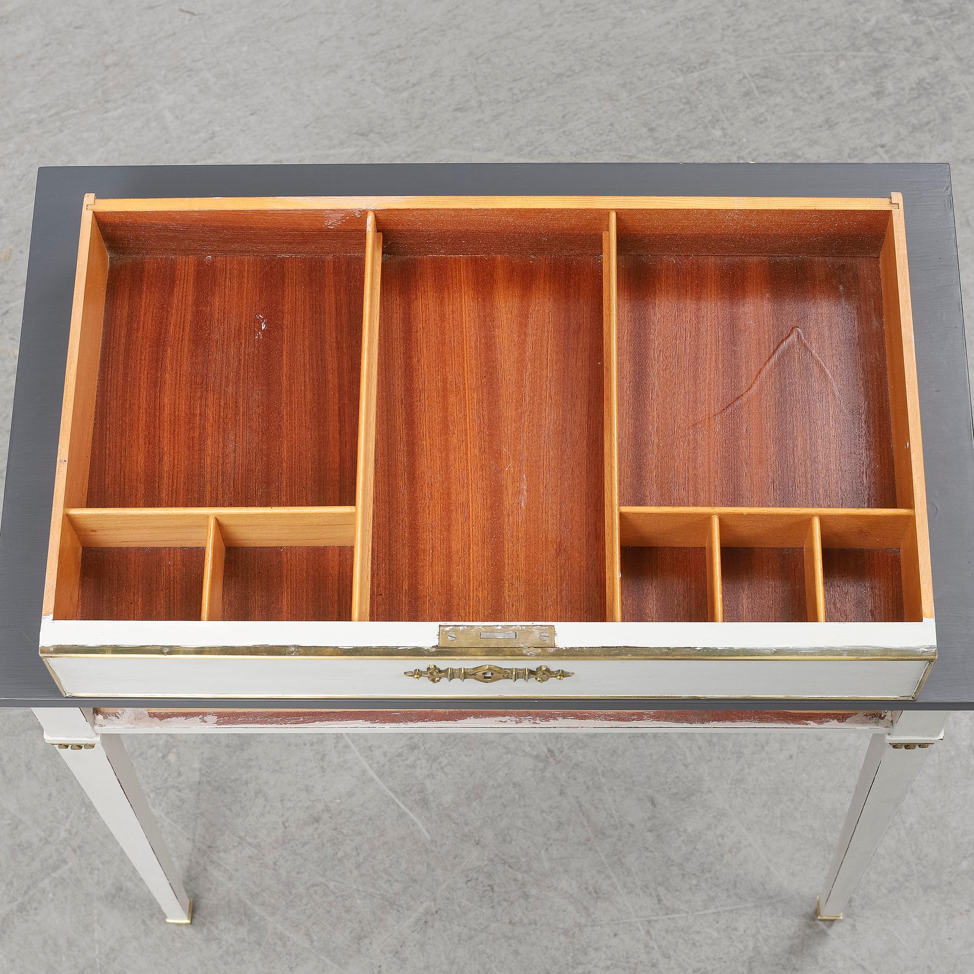 A Gustavian style table, first half of the 20th century.