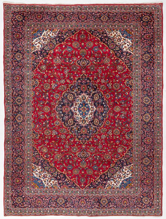 An Oriental carpet, c. 396 x 300 cm.