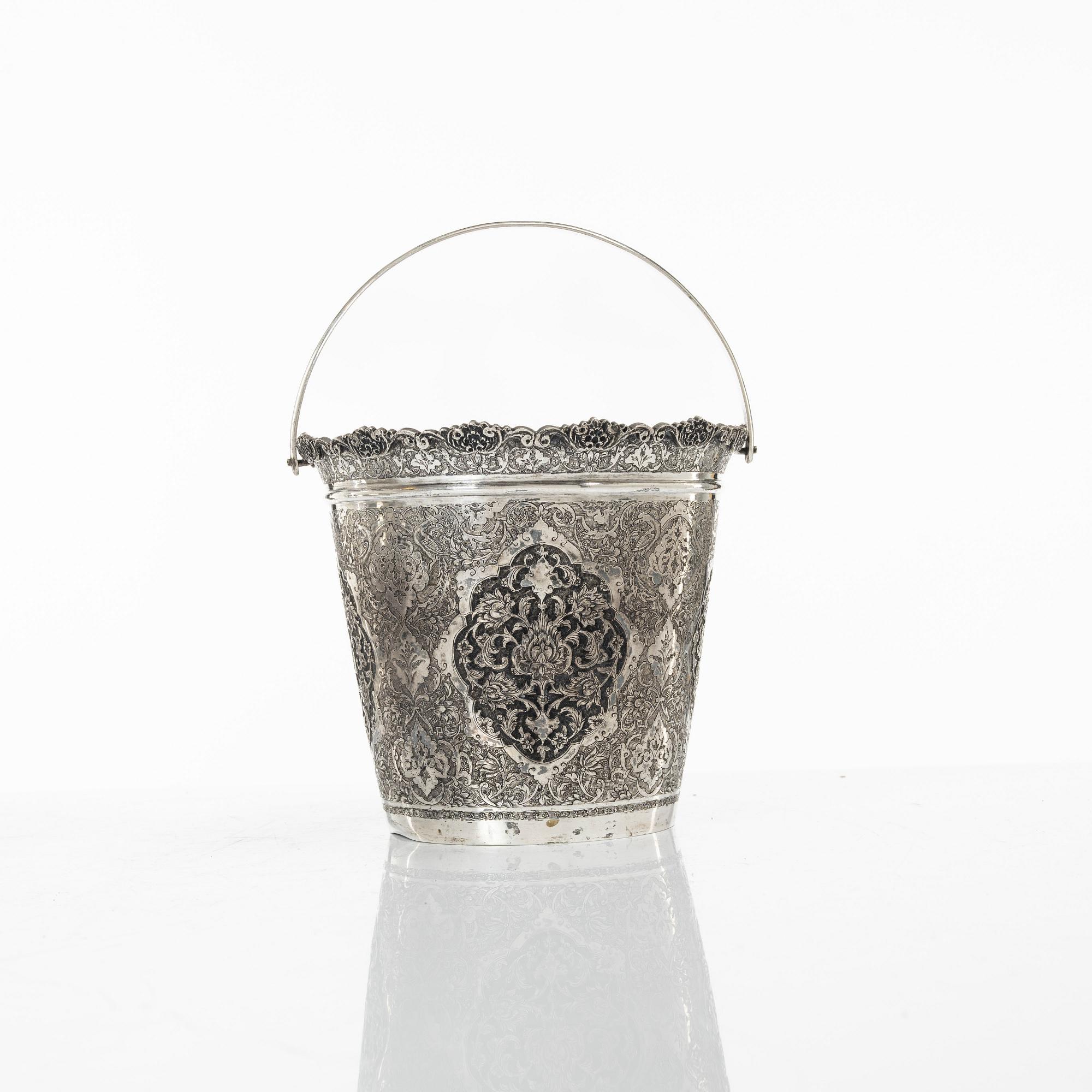 A Persian silver bowl and a silver bucket, 20th century.