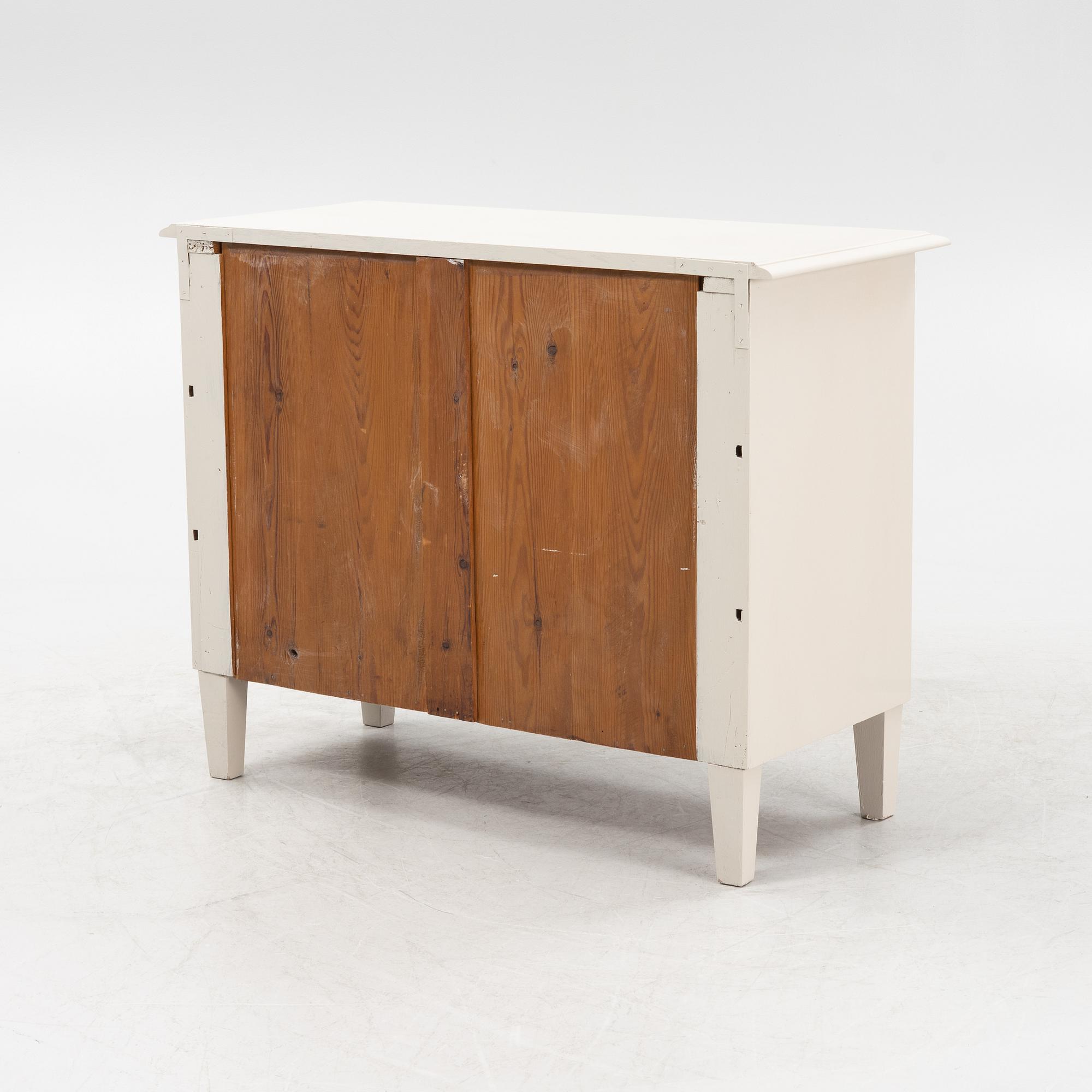 A Gustavian style chest of drawers, around 1900.