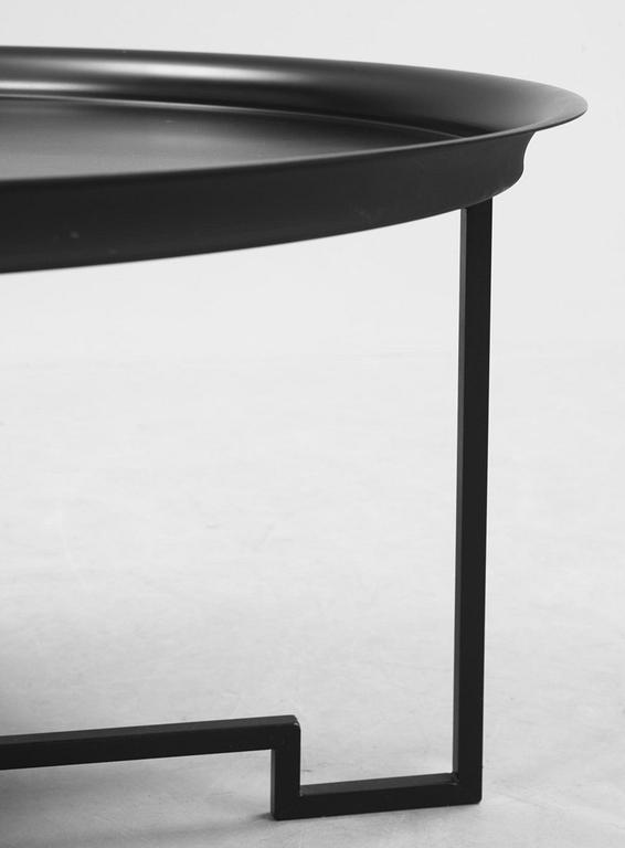 A Per Öberg black lacquered sofa table, Svenskt Tenn, post 2000.