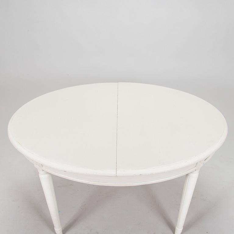 A Gustavian style dining table, mid 20th century.