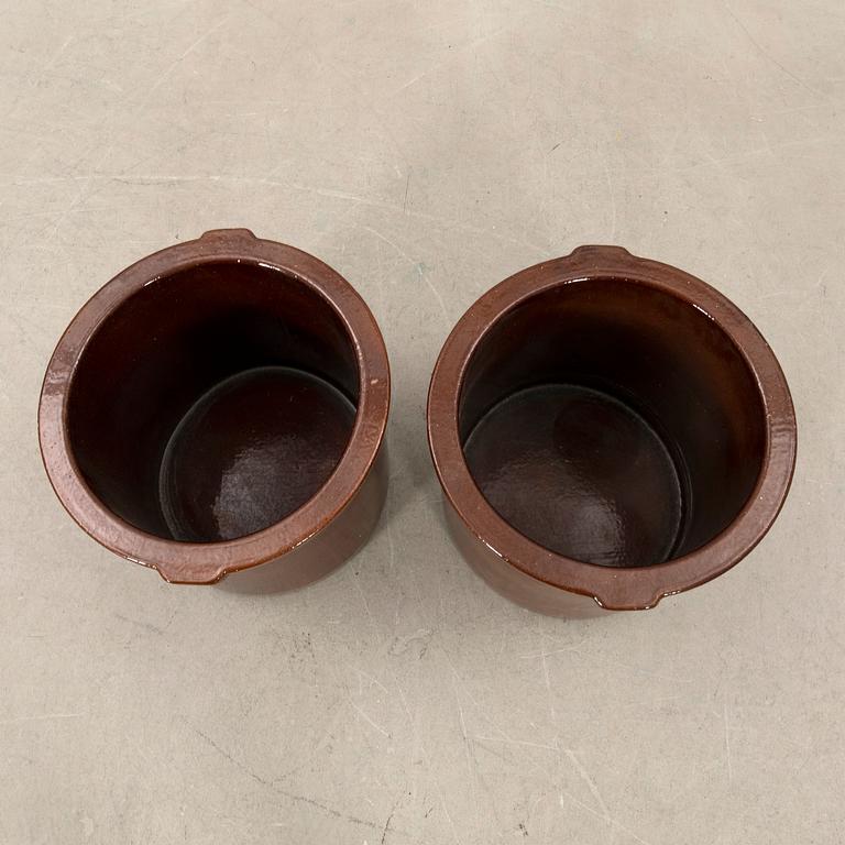 outer casing/vessel a pair of glazed ceramics.