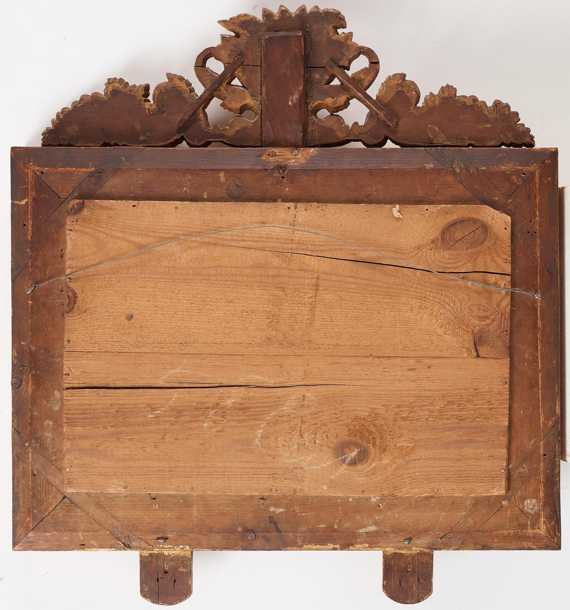 A pair of Swedish Empire two-light girandole mirrors, first half of the 19th century.