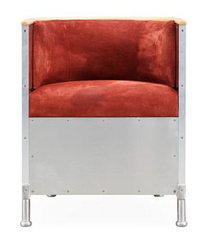 108. A Mats Theselius aluminium and suede armchair by Källemo AB.