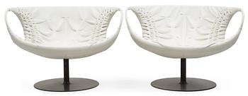 A pair of Patricia Urquiola 'Smock' steel and white leather easy chairs, Moroso, Italy.