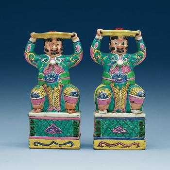 A pair of famille rose censer-stick holders, Qing dynasty, Qianlong (1736-95).