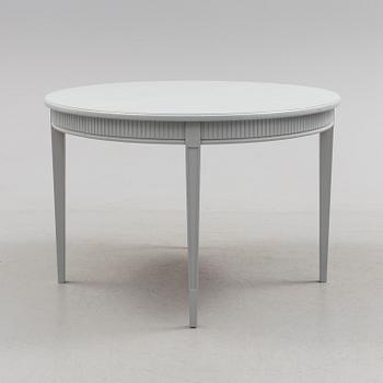 A Gustavian style dining table, mid 20th Century.