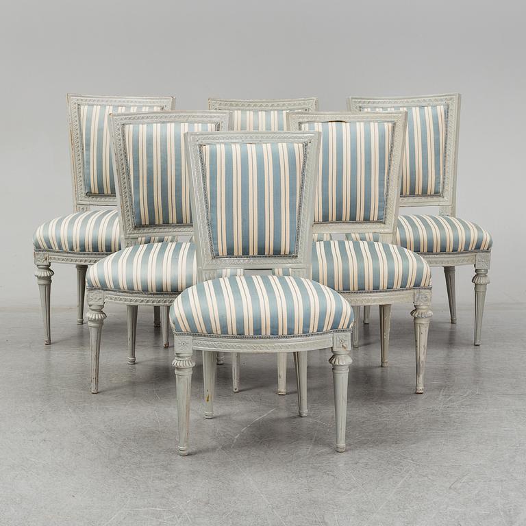 Six (3+2+1) late 18th century Gustavian chairs.