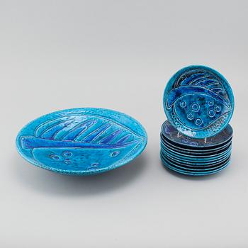 A stoneware bowl and twelve small plates, designed Charlotte Hamilton for Rörstrand, mid 20th century.