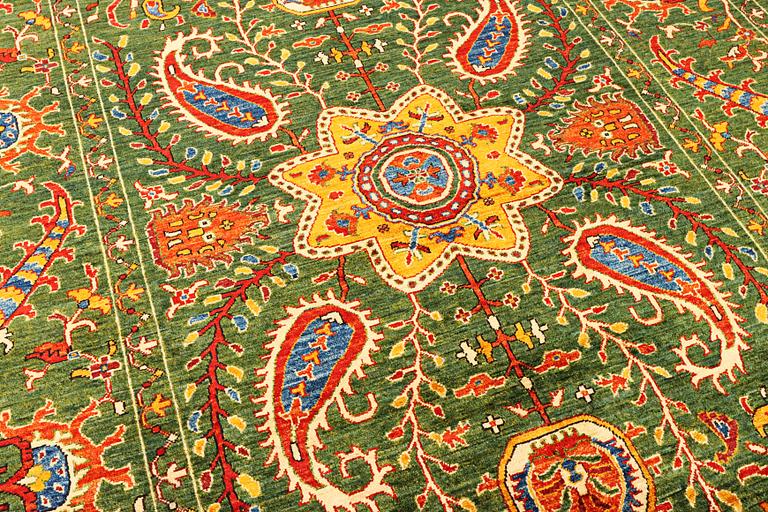 A Kazak carpet, c. 304 x 205 cm.
