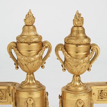 A pair of Louis XVI 18th Century bronze chenets.