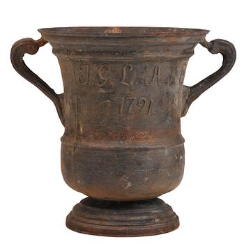 218. A cast-iron garden urn from Hellefors styckebruk, dated 1791.