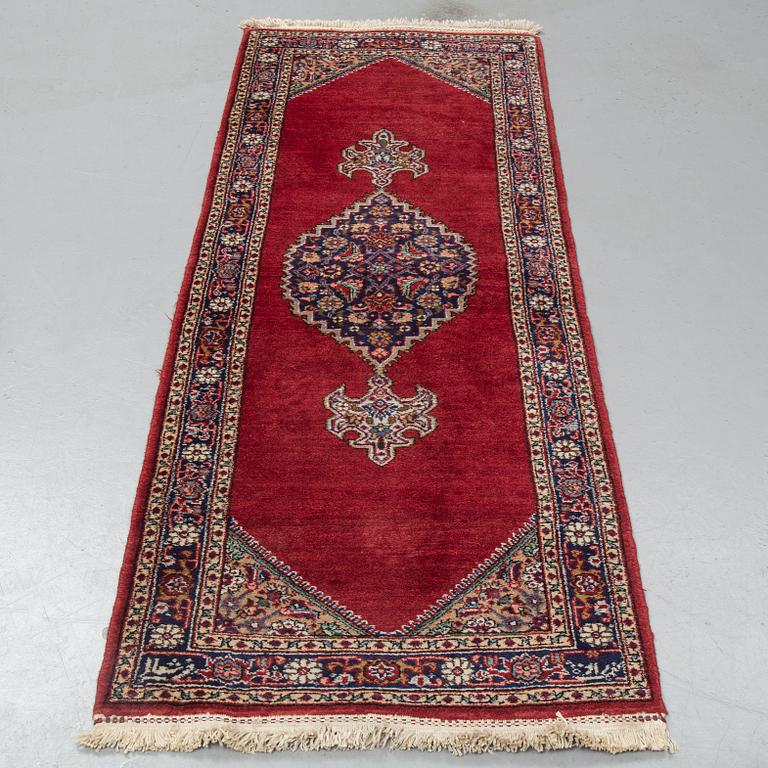 A runner, Tabriz probably, signed, ca 193 x 70 cm.