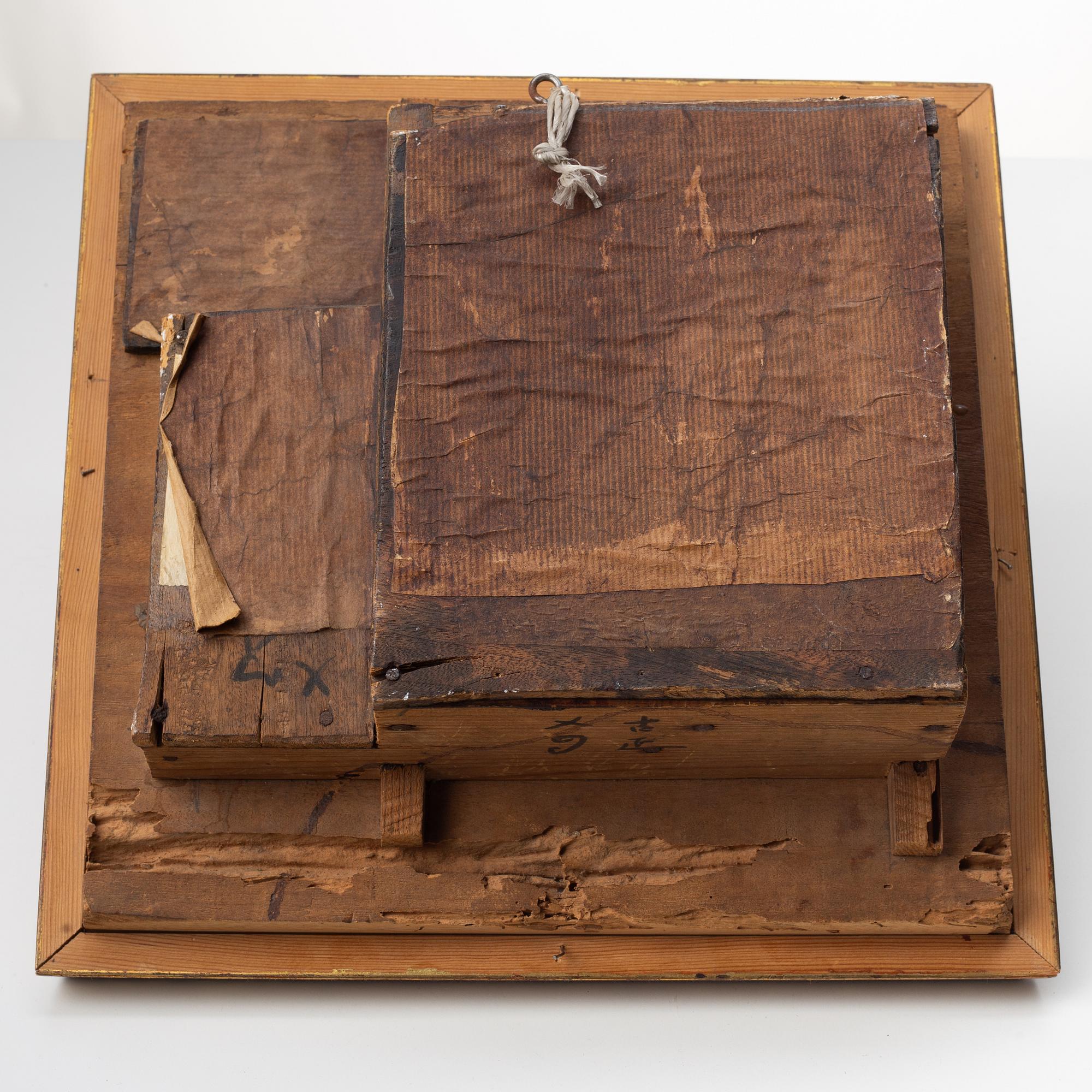 A Chinese wooden panel in deep relief, Qing dynasty, 19th century.