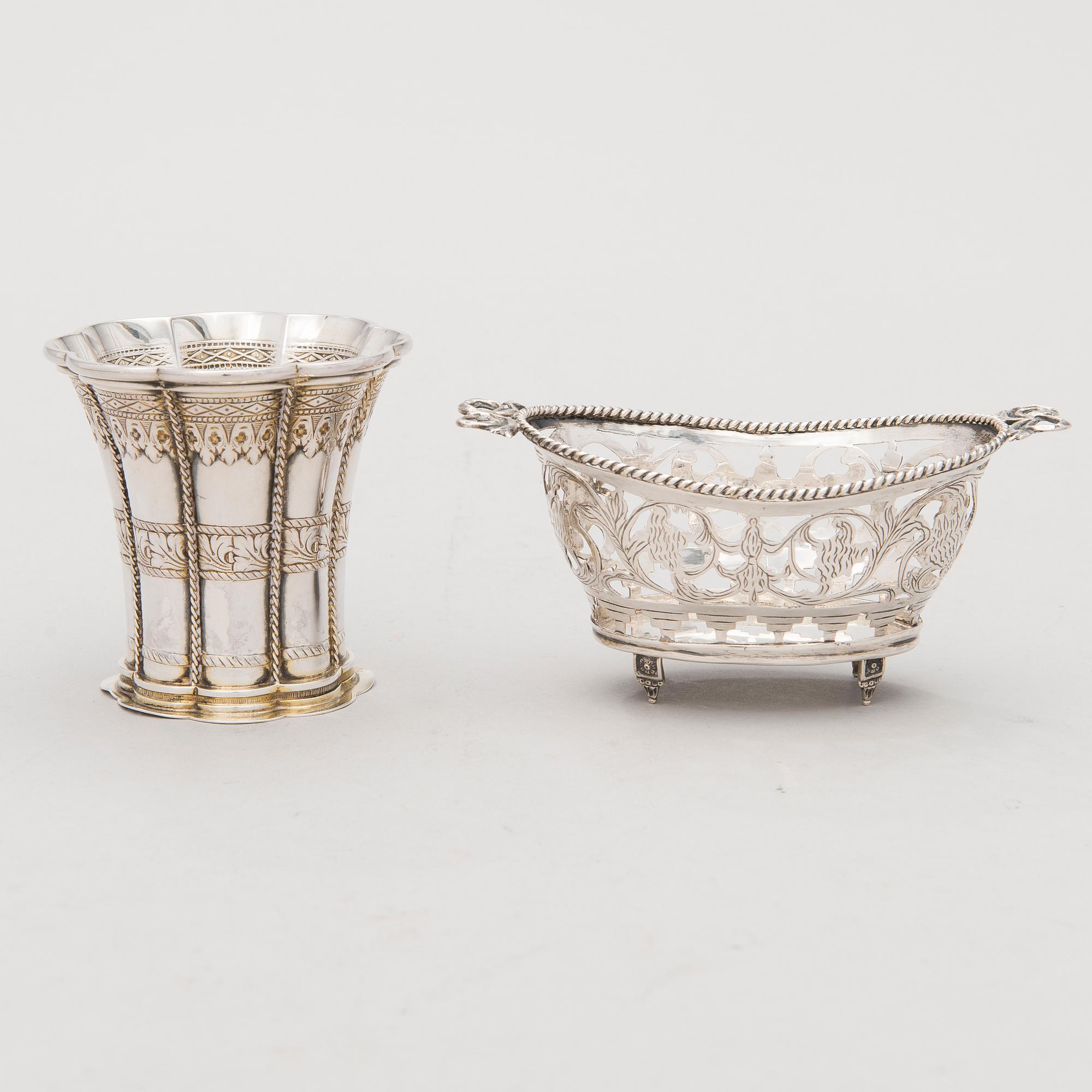 Four silver objects from the 20th Century.