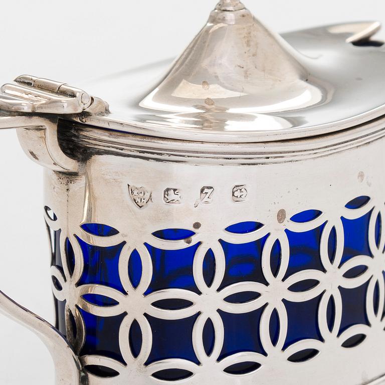 A silver mustard pot and spoon, salt cellars and salt spoons, totally 11 pieces, late 19th century - 20th century.