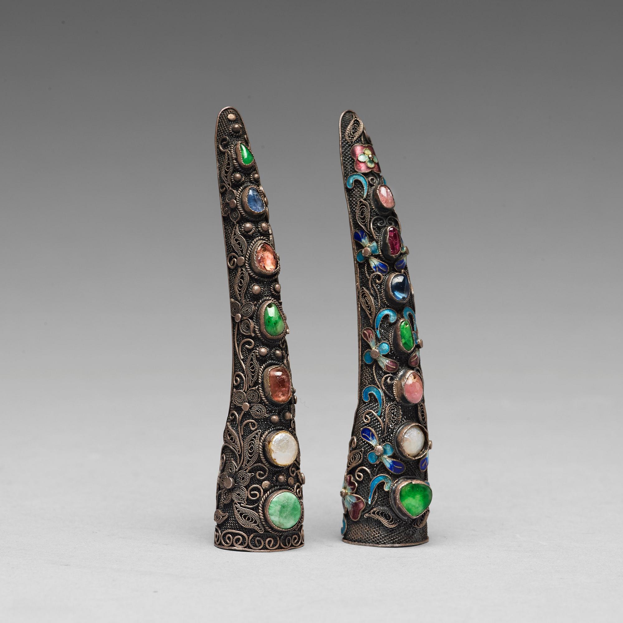 Two silvered nail covers, Qing dynasty, 19th Century.