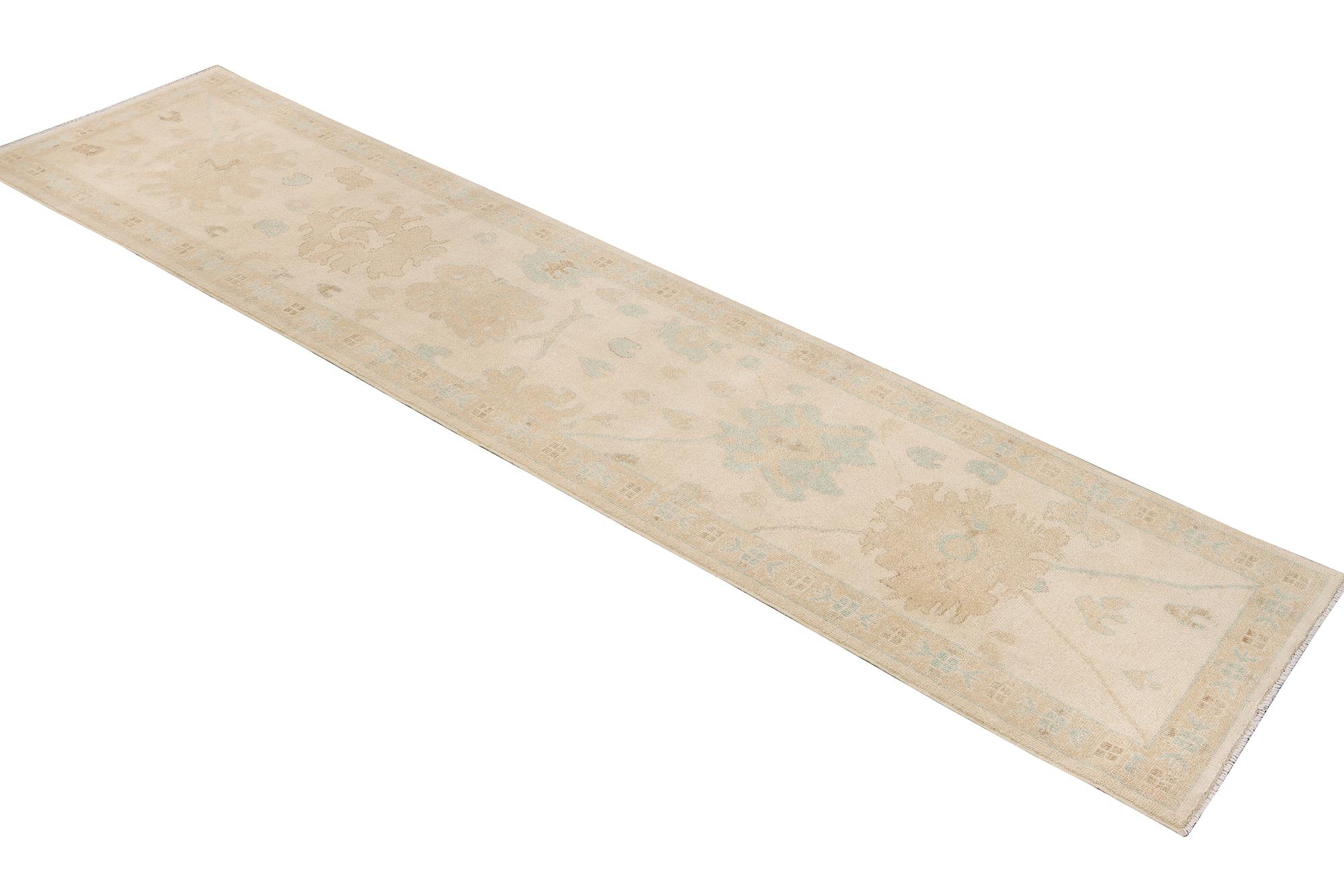 An Ushak runner carpet, c. 360 x 80 cm.