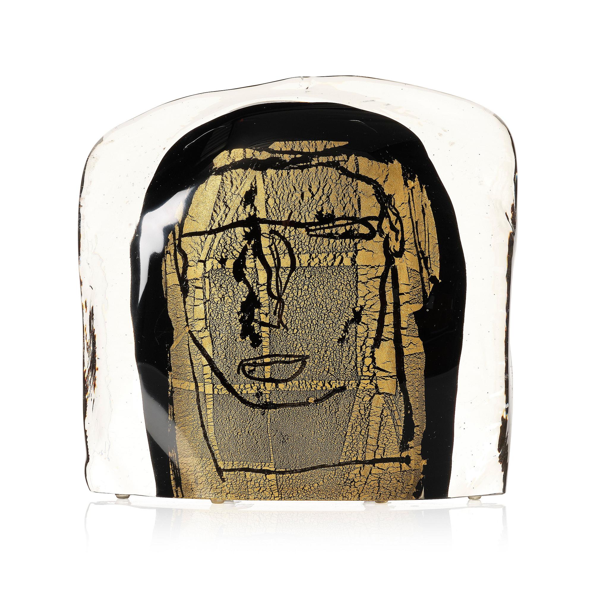 Luigi Benzoni, a glass sculpture of a head, Berengo Studio, Murano, Italy 1999.