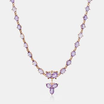 639. An amethyst and seed pearl necklace. French hallmarks.