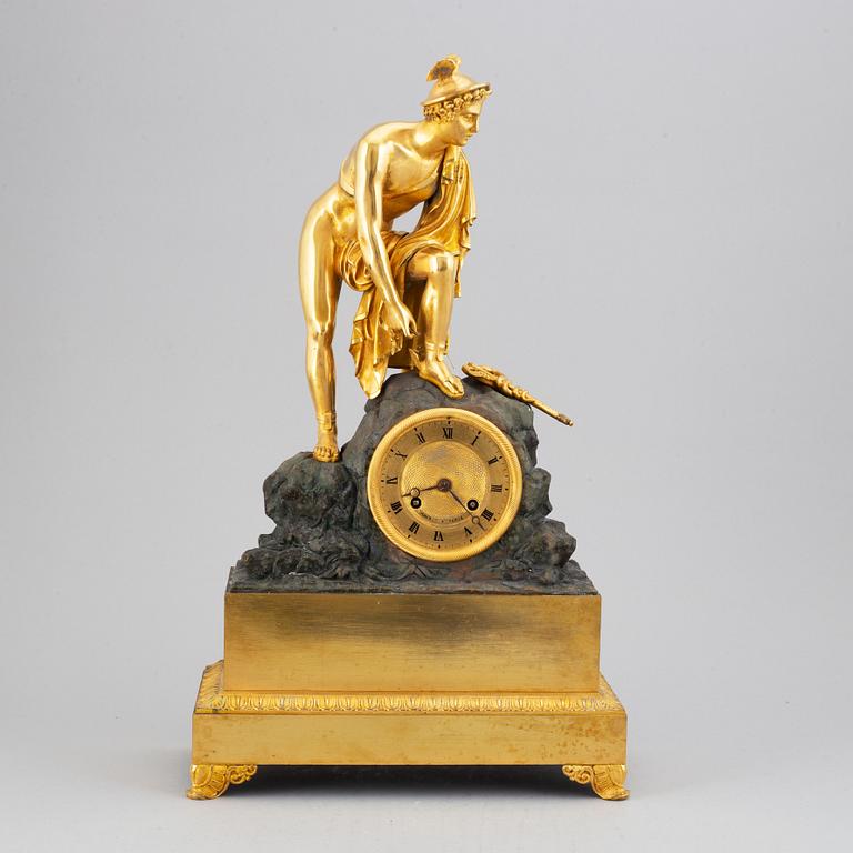 A french Empire pendulum clock, first half of the 19th century.