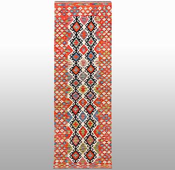 A runner kilim, ca 291 x 84 cm.