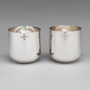 Tapio Wirkkala, An 8-piece set of silver beakers, marked TW, Kultakeskus oy, Hämeenlinna, Finland 2002 and 2009.