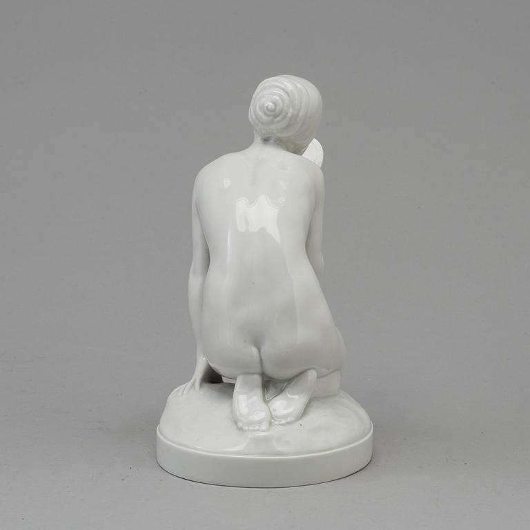 A white glazed Royal Copenhagen Gerhard Henning porcelain figure, Denmark, 1910's.